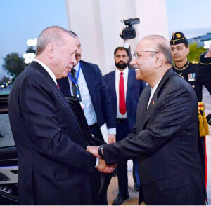 President Asif Ali Zardari welcoming the President of Turkiye, Mr Recep Tayyip Erdogan, upon his arrival at Aiwan-e-Sadr