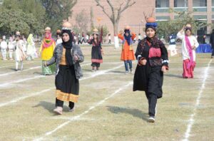 Students are participating in the Chati Race during annual sports event at Multan Public School.