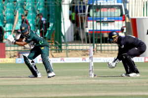 Pakistan's Babar Azam plays a shot during the final one-day international (ODI) cricket match of Tri-Nation series between Pakistan and New Zealand at the National Stadium