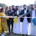 Brother Zohaib Gill cutting the ribbon to inaugurate the spring festival at La Salle Higher Secondary School