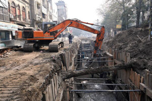 Labourers use heavy machinery at Naba Road as part of a major development project in the Provincial Capital
