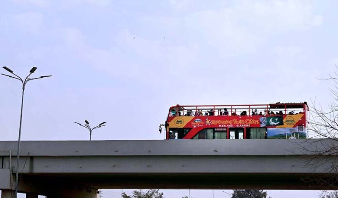 A view of double-decker tour bus service which start from Rawalpindi towards Islamabad for people to visit Faisal Mosque, Daman-e-Koh, Saidpur Village, Parliament House, the Supreme Court, Lok Virsa and the National Museum and other tourist places of Federal Capital