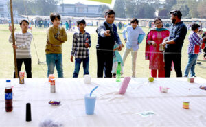 Students enjoy on the Jumping jack during the spring festival at La Salle Higher Secondary School
