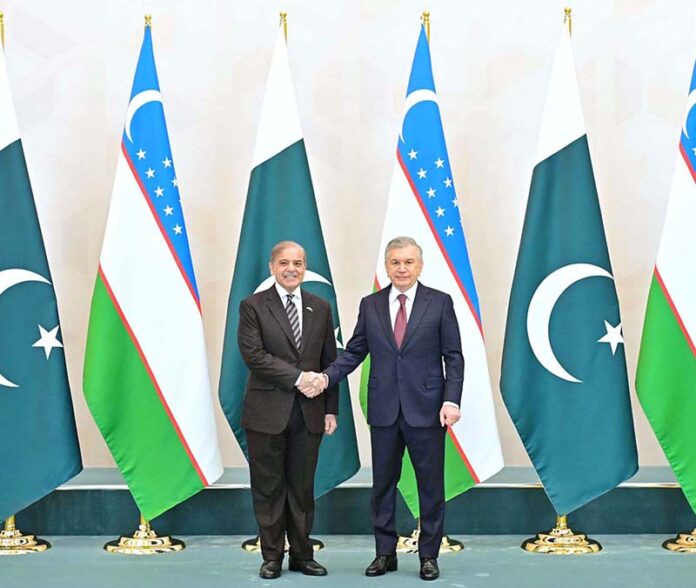 President of Uzbekistan H.E Shavkat Mirziyoyev receiving Prime Minister Muhammad Shehbaz Sharif on his arrival at the Congress Centre Tashkent