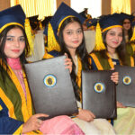 Successful graduate students showing their degrees during 22nd convocation of ISRA University