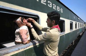 A lady health workers administer polio drops to a gypsy child in Latifabad during to the National Anti-Polio Campaign 2025.
