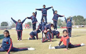 Students are participating in the Chati Race during annual sports event at Multan Public School.