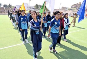 Students participate in the grand opening ceremony of the Girls Larkana Sports Festival 2025 at MA Khuhro Sports Complex.