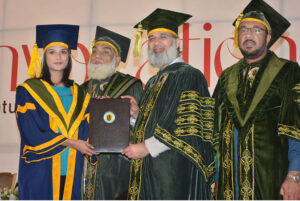 ISRA Islamic foundation President Prof. Dr. Hamidullah Qazi is giving away Gold medal among to the successful graduate student during 22nd convocation of ISRA University