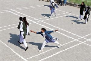 Students participate in the grand opening ceremony of the Girls Larkana Sports Festival 2025 at MA Khuhro Sports Complex.