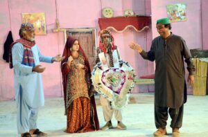 Artists performing in a stage drama " Pyar Zindagi Hai/ Love is Life " on late Saturday night at Arts Council of Pakistan Larkana Hall