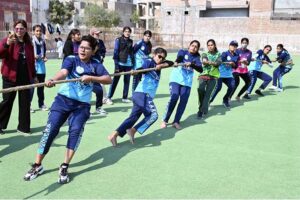 Students participate in the grand opening ceremony of the Girls Larkana Sports Festival 2025 at MA Khuhro Sports Complex.