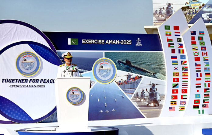 Commander Pakistan Fleet Rear Admiral Abdul Munib addresses the inaugural ceremony of the 9th Multinational Maritime Exercise AMAN 2025 in provincial capital
