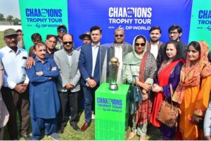 DC Hyderabad Zain-ul-Abideen along with others posing photograph with ICC Champions Trophy at Niaz Stadium during ICC Men’s Champions Trophy 2025 Trophy Tour.