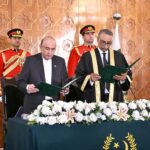 President Asif Ali Zardari administering the oath of office to Mr Justice Sardar Muhammad Sarfraz Dogar as the Acting Chief Justice of Islamabad High Court, at Aiwan-e-Sadr