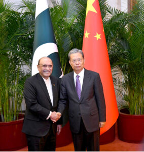 President Asif Ali Zardari being welcomed by the Chairman of the Standing Committee of the National People's Congress of the People's Republic of China, Mr Zhao Leji
