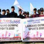 Players of Pakistan Sweet Home attending the opening ceremony of Larkana Sports Festival 2025 at Municipal Stadium