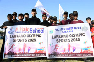 Players of Pakistan Sweet Home attending the opening ceremony of Larkana Sports Festival 2025 at Municipal Stadium