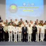 Federal Minister for Defence Khawaja Asif and Chief of the Naval Staff (CNS) Admiral Naveed Ashraf NI (M) T Bt in a group photograph along with other participants during AMAN Dialogue 2025 'Secure Seas - Prosperous Future