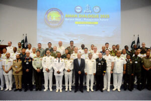 Federal Minister for Defence Khawaja Asif and Chief of the Naval Staff (CNS) Admiral Naveed Ashraf NI (M) T Bt in a group photograph along with other participants during AMAN Dialogue 2025 'Secure Seas - Prosperous Future