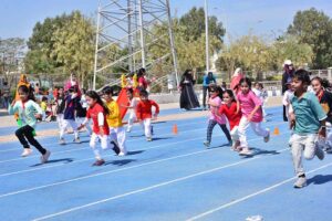 Students participating in race competition during Annual Sports Gala of The Smart School at Public Sports Ground.