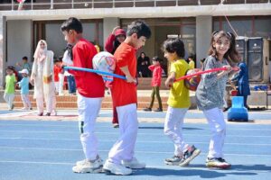 Students participating in race competition during Annual Sports Gala of The Smart School at Public Sports Ground.