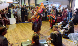 Folk singer Taj Mastani presenting her performance at the PIA stall during the third day of Pakistan Travel Mart at the Expo Center