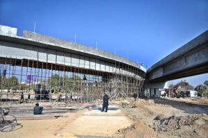 Labourers busy in construction work of F-8 Exchange Chowk Interchange project during development work in Federal Capital.