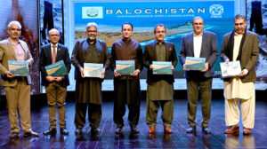 Federal Minister of Energy Sardar Awais Ahmed Khan Leghari addresses the audience at the launch of a coffee table book and large-format photo exhibition in the federal capital