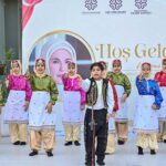 Students performing in tableau on stage at Maarif School in Sector H-8