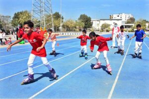 Students participating in race competition during Annual Sports Gala of The Smart School at Public Sports Ground.