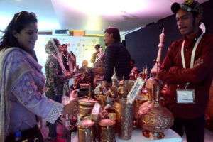 Women visiting stalls during the third day of Pakistan Travel Mart at the Expo Center
