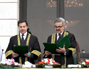 Hon'ble Mr. Justice Yahya Afridi, Chief Justice of Pakistan administering the oath of office to Mr. Justice Miangul Hassan Aurangzeb, Judge, Islamabad High Court as Acting Judge of the Supreme Court of Pakistan