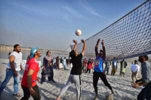 Player in action in volleyball match during Sindh Darya Games 2025 organized by Sindh Sports and Youth Affairs Department at bank of Indus River