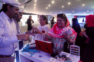 Women visiting stalls during the third day of Pakistan Travel Mart at the Expo Center