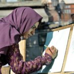 Student making sketch during Painting and Calligraphy Exhibition organized in collaboration with Walled City at Masjid Wazir khan Square inside the Knowledge of Art Academy at Delhi Gate