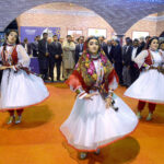 Sindh Governor Kamran Khan Tessori seeing the traditional dance of Tajikistan at the Tajikistan stall during the second day of Pakistan Travel Mart at the Expo Center