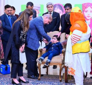 Prime Minister Muhammad Shehbaz Sharif administers polio vaccine to children at the inaugural ceremony of the National Polio Campaign 2025