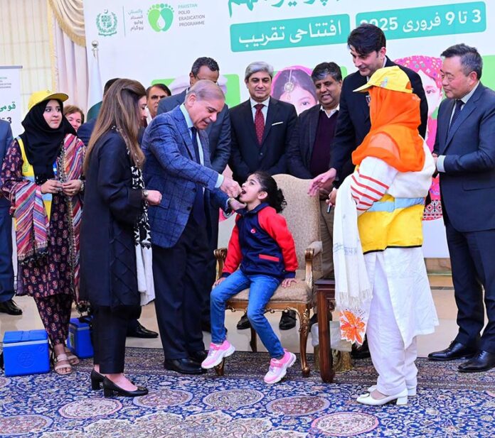 Prime Minister Muhammad Shehbaz Sharif administers polio vaccine to children at the inaugural ceremony of the National Polio Campaign 2025