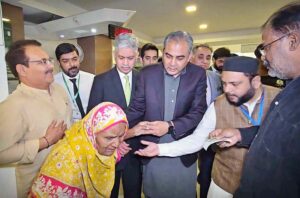 Interior Minister Mohsin Naqvi interacting with citizens at NADRA Mega Center in Nazimabad