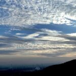 A mesmerizing skyscape of Islamabad from Daman-e-Koh, with floating clouds enhancing its scenic beauty
