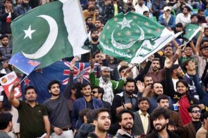 Spectators enjoy while watching first match of the Tri-Nation Series played between Pakistan and New Zealand cricket teams at Gaddafi Stadium