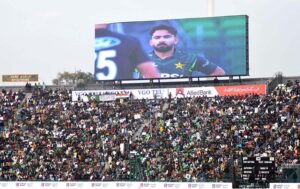 Spectators enjoy while watching first match of the Tri-Nation Series played between Pakistan and New Zealand cricket teams at Gaddafi Stadium