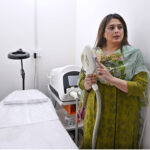 Experienced aesthetic specialist and former member of Punjab Assembly, Ms. Mehnaz Saeed, briefing about the aesthetic machines after inaugurating the new aesthetic clinic at F-11