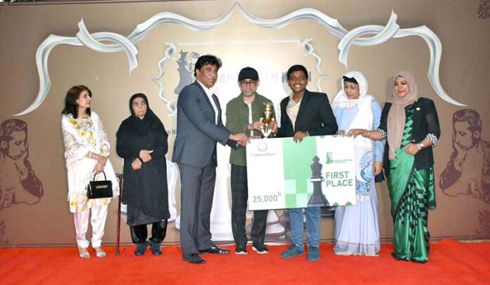 Adviser on Cultural Affairs of Bangladesh, Mostofa Sarwar Farooki and Pakistan High Commissioner Syed Ahmed Maroof awards trophy and cash prize to the winner of the 2nd Mian Sultan Khan Chess Tournament organized by the Pakistan High Commission