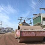 A labourer busy in construction work of flyover at 47 Adda to Qainchi Morr