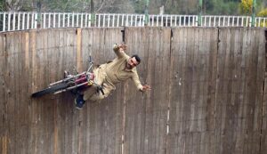 A motorcyclist demonstrates his skills while riding a motorcycle in the 'Well of Death' at the Lucky Irani Circus in F-9 Park.