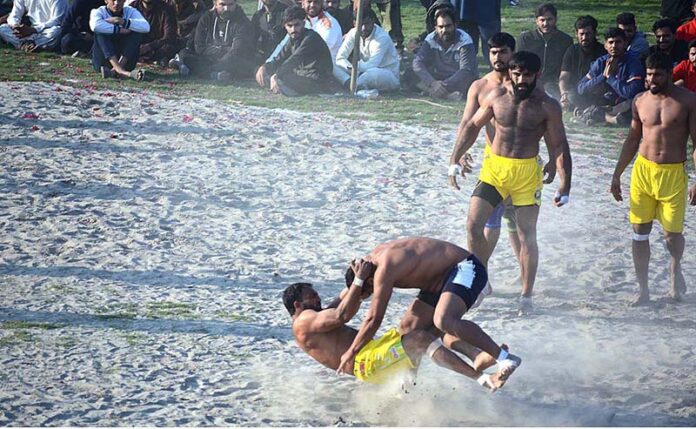 A view of a Kabaddi match plays between the Shaheen Kabaddi Club and Sanjha Punjab Kabaddi Club teams during 6th Nankana Kabaddi Cup at Malik Pur Stadium
