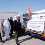 Vice President Al Khidmat Foundation Air Vice Marshall (Retd) Arshad Malik inspecting relief goods for Palestinians at old terminal of Karachi Airport