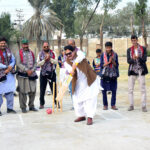 MPA Sabir Qaimkhani hits ball during inauguration ceremony of U-14 League Color Shirt Cricket Championship Trophy at Degree Cricket Ground